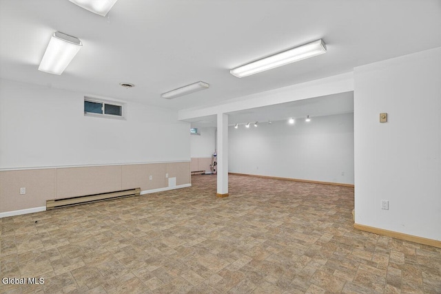 3 Pine Ridge Rd, Saratoga Springs, NY 12866 - finished below grade area featuring a baseboard heating unit and baseboards