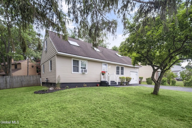 27 Wendell Dr, Colonie, NY 12205 - view of front of house with asphalt driveway, roof with shingles, cooling unit, and a garage