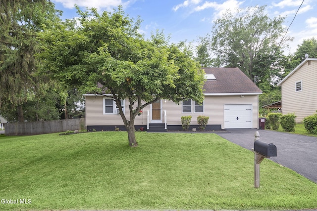 27 Wendell Dr, Colonie, NY 12205 - view of front facade featuring driveway, an attached garage, entry steps, and roof with shingles