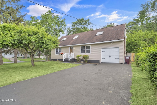 27 Wendell Dr, Colonie, NY 12205 - view of front of house with a front yard, asphalt driveway, an attached garage, and a shingled roof