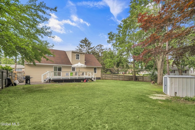 27 Wendell Dr, Colonie, NY 12205 - fenced backyard featuring a wooden deck and a storage shed