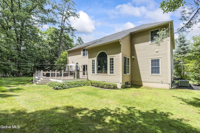 222 Bell Ct, Guilderland, NY 12303 - back of property featuring a yard and a wooden deck