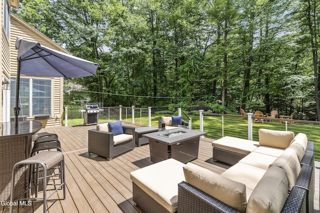 222 Bell Ct, Guilderland, NY 12303 - wooden deck featuring an outdoor living space with a fire pit, a yard, and view of scattered trees