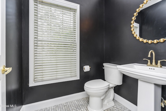 222 Bell Ct, Guilderland, NY 12303 - bathroom featuring baseboards and toilet
