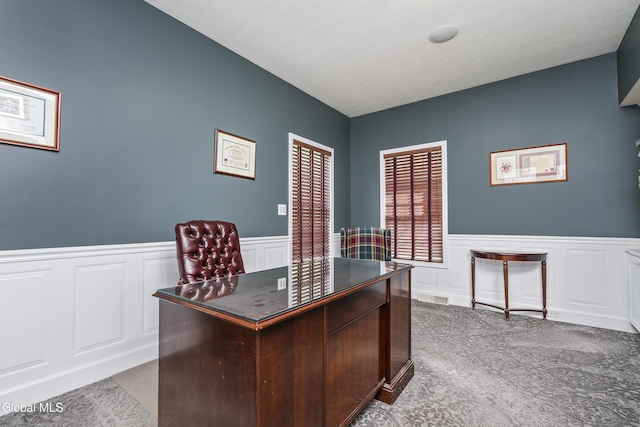 222 Bell Ct, Guilderland, NY 12303 - carpeted home office featuring wainscoting and a decorative wall