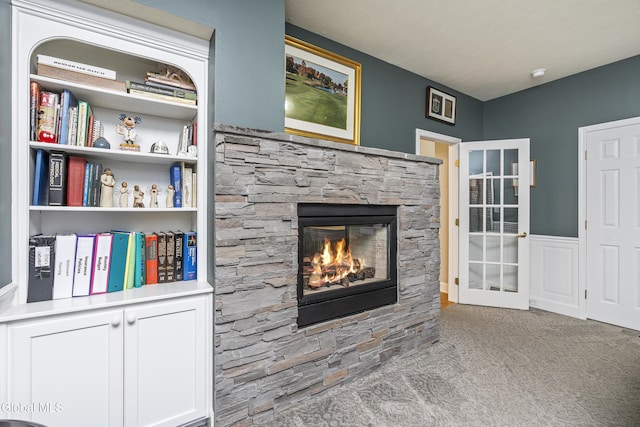 222 Bell Ct, Guilderland, NY 12303 - carpeted living area with a fireplace