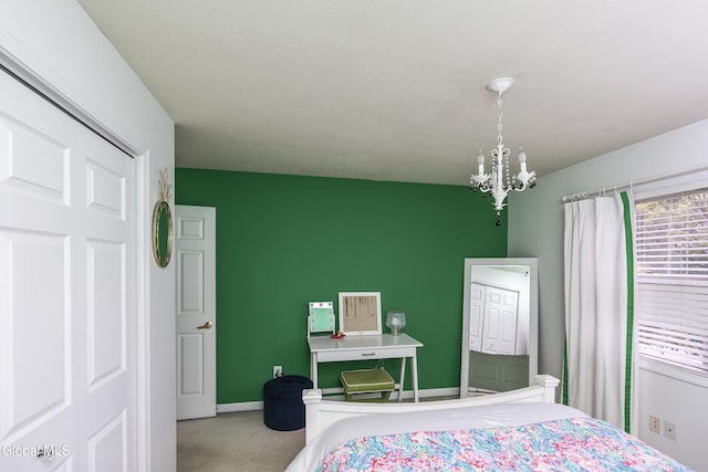 222 Bell Ct, Guilderland, NY 12303 - carpeted bedroom featuring a chandelier and baseboards