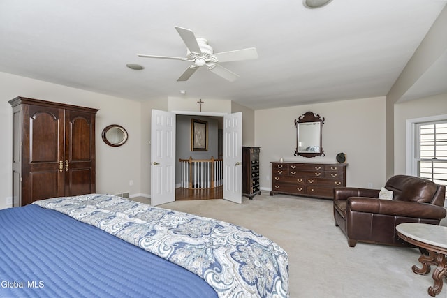 222 Bell Ct, Guilderland, NY 12303 - bedroom featuring light carpet and a ceiling fan
