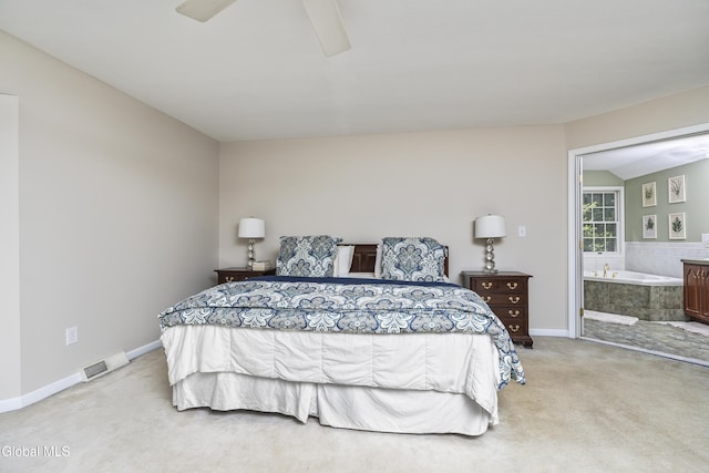 222 Bell Ct, Guilderland, NY 12303 - bedroom featuring light colored carpet, connected bathroom, and ceiling fan