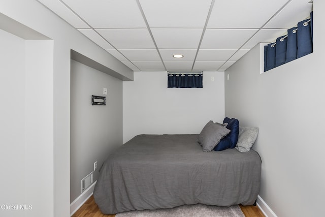 222 Bell Ct, Guilderland, NY 12303 - bedroom with a drop ceiling, wood finished floors, and recessed lighting