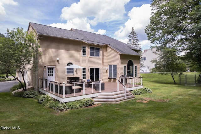 222 Bell Ct, Guilderland, NY 12303 - rear view of property with outdoor lounge area, a lawn, a wooden deck, and a shingled roof