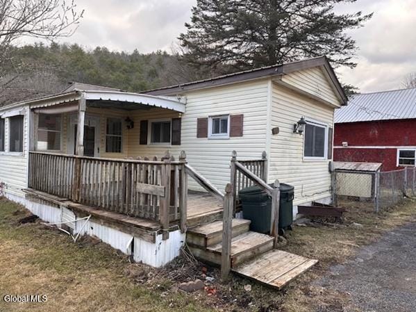 873 W Fulton Rd, Fulton, NY 12187 - back of property featuring a deck