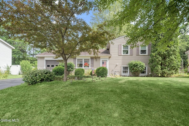 12 Jean Pl, Guilderland, NY 12303 - split level home featuring a front yard and an attached garage