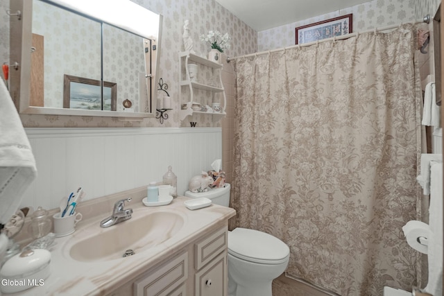 12 Jean Pl, Guilderland, NY 12303 - bathroom featuring a wainscoted wall, vanity, wallpapered walls, and a shower with shower curtain