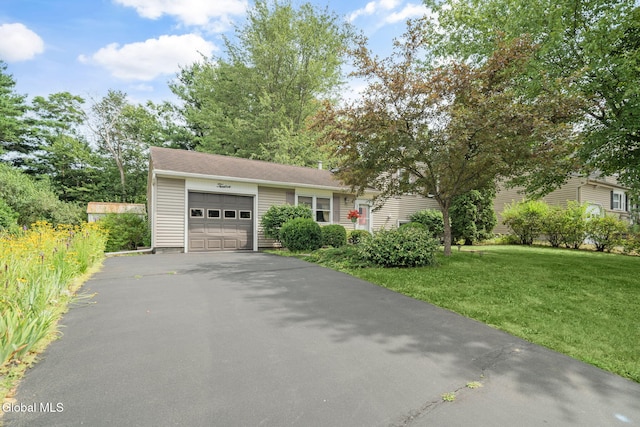12 Jean Pl, Guilderland, NY 12303 - view of front of home with a garage, driveway, and a front yard