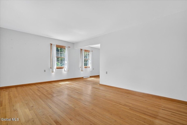 3 Roberts Ln, Saratoga Springs, Inside, NY 12866 - empty room featuring light wood-style floors and baseboards