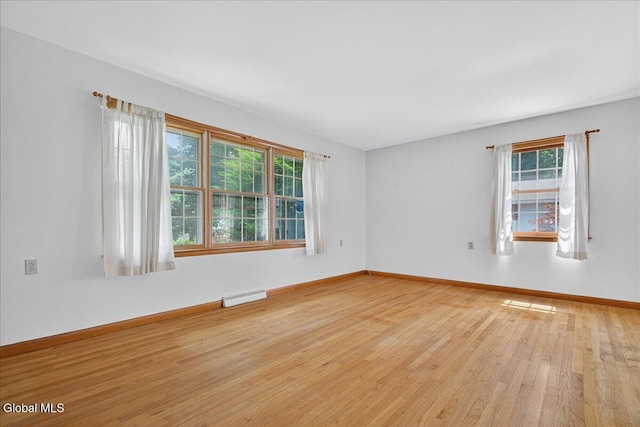 3 Roberts Ln, Saratoga Springs, Inside, NY 12866 - spare room featuring light wood-type flooring and baseboards