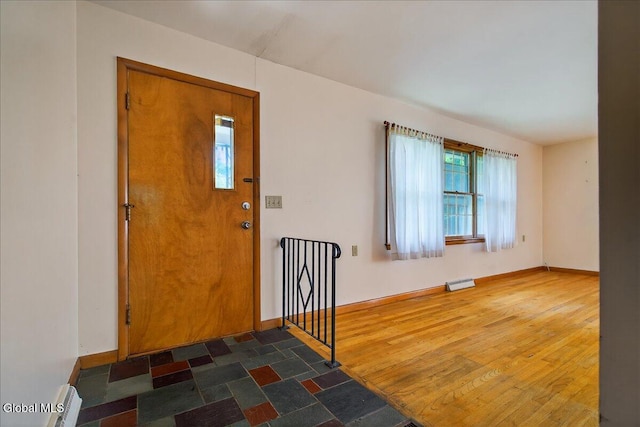 3 Roberts Ln, Saratoga Springs, Inside, NY 12866 - foyer featuring baseboards and wood finished floors