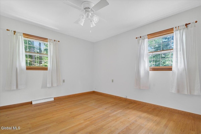 3 Roberts Ln, Saratoga Springs, Inside, NY 12866 - unfurnished room with healthy amount of natural light, light wood-style floors, and a ceiling fan
