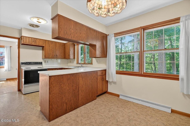 3 Roberts Ln, Saratoga Springs, Inside, NY 12866 - kitchen with white electric stove, baseboard heating, brown cabinets, light countertops, and a peninsula