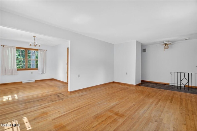 3 Roberts Ln, Saratoga Springs, Inside, NY 12866 - unfurnished room with a chandelier, light wood-style floors, a baseboard radiator, and a ceiling fan
