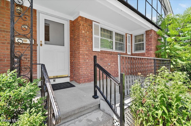 3 Roberts Ln, Saratoga Springs, Inside, NY 12866 - view of exterior entry with brick siding