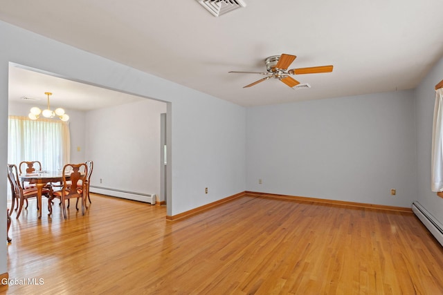 2351 Oakland Ave, Schenectady, NY 12309 - empty room with a baseboard heating unit, light wood-type flooring, a chandelier, and ceiling fan