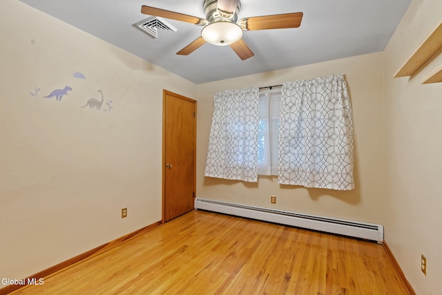2351 Oakland Ave, Schenectady, NY 12309 - empty room with a baseboard heating unit, light wood-type flooring, and a ceiling fan