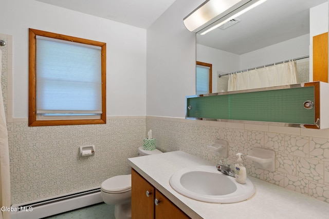 2351 Oakland Ave, Schenectady, NY 12309 - bathroom featuring baseboard heating, vanity, a wainscoted wall, a shower with curtain, and tile walls