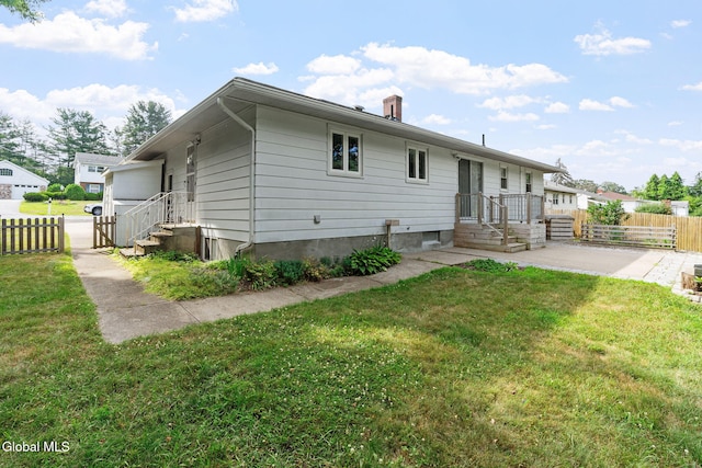2351 Oakland Ave, Schenectady, NY 12309 - rear view of property featuring a chimney and a patio