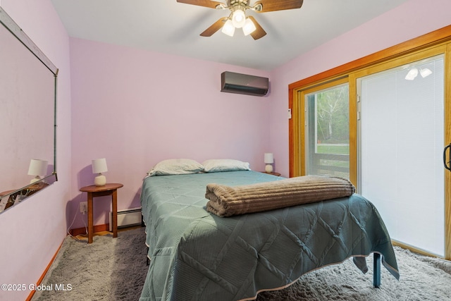 35 Scribner Hollow Rd # E3, Hunter, NY 12442 - carpeted bedroom with a wall mounted air conditioner, ceiling fan, and baseboard heating