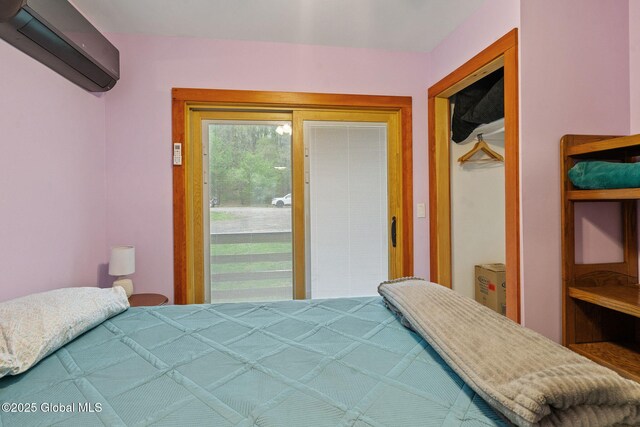 35 Scribner Hollow Rd # E3, Hunter, NY 12442 - bedroom with a wall mounted air conditioner