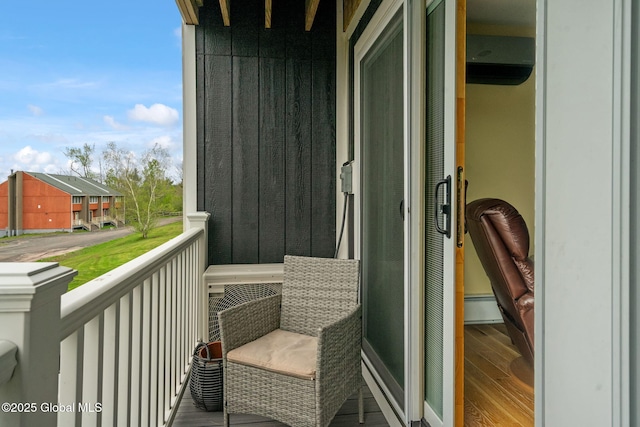 35 Scribner Hollow Rd # E3, Hunter, NY 12442 - balcony featuring a wall mounted AC and a baseboard radiator