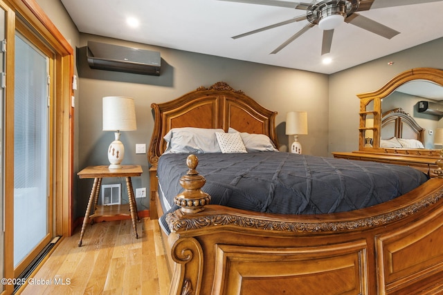 35 Scribner Hollow Rd # E3, Hunter, NY 12442 - bedroom with an AC wall unit, light wood finished floors, recessed lighting, and a ceiling fan