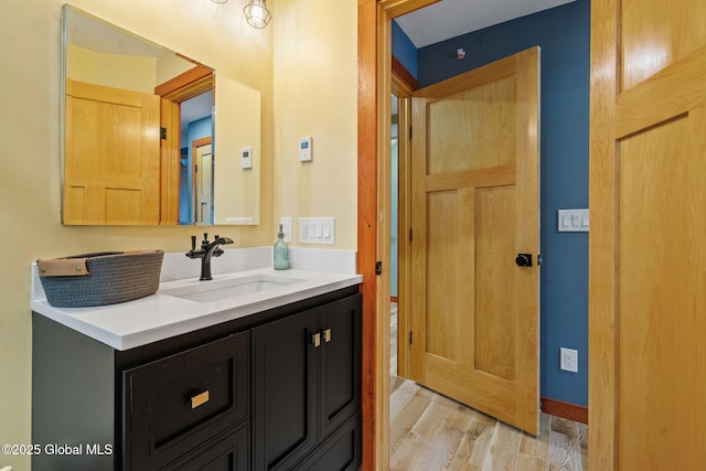 35 Scribner Hollow Rd # E3, Hunter, NY 12442 - bathroom with vanity and wood finished floors
