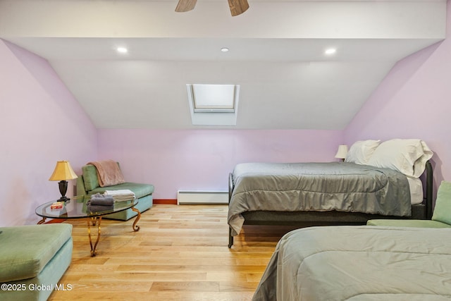 35 Scribner Hollow Rd # E3, Hunter, NY 12442 - bedroom featuring baseboard heating, lofted ceiling, wood finished floors, ceiling fan, and recessed lighting