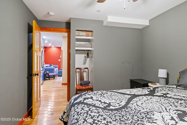 35 Scribner Hollow Rd # E3, Hunter, NY 12442 - bedroom featuring light wood-style flooring and ceiling fan