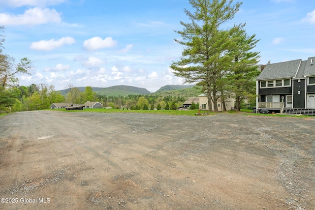 35 Scribner Hollow Rd # E3, Hunter, NY 12442 - view of dirt / gravel road with a mountain view