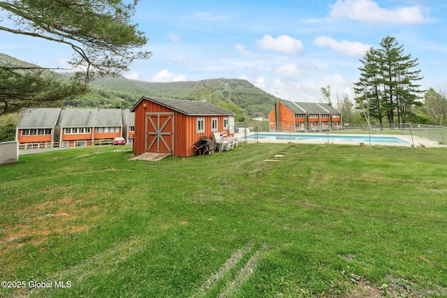 35 Scribner Hollow Rd # E3, Hunter, NY 12442 - view of yard featuring a mountain view and a storage shed