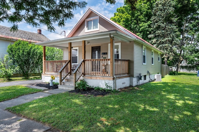 10 3rd St, South Glens Falls, NY 12803 - bungalow-style home featuring a porch and a front yard