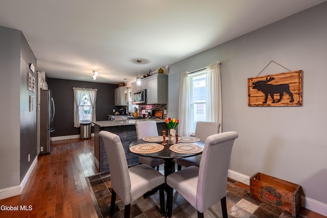 10 3rd St, South Glens Falls, NY 12803 - dining space featuring dark wood finished floors