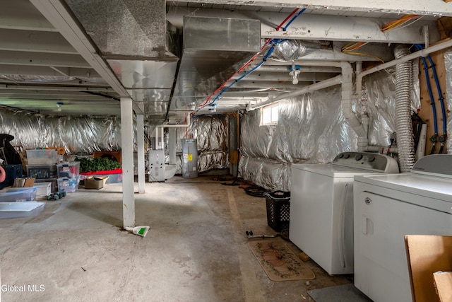 10 3rd St, South Glens Falls, NY 12803 - basement featuring independent washer and dryer, heating unit, and water heater