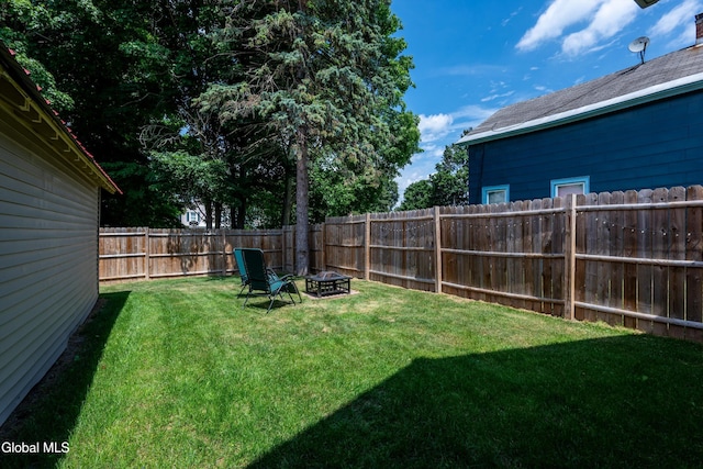 10 3rd St, South Glens Falls, NY 12803 - fenced backyard with a fire pit