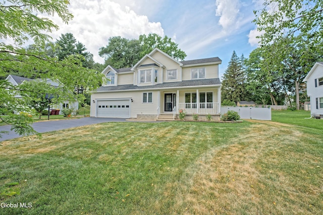 33 Cindy Ln, Halfmoon, NY 12065 - traditional-style home with a porch, asphalt driveway, and a garage