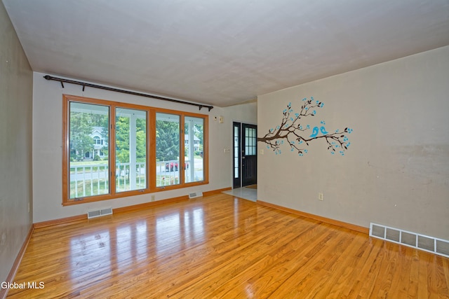 33 Cindy Ln, Halfmoon, NY 12065 - spare room with light wood finished floors