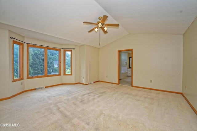 33 Cindy Ln, Halfmoon, NY 12065 - unfurnished room with light colored carpet, a ceiling fan, and vaulted ceiling