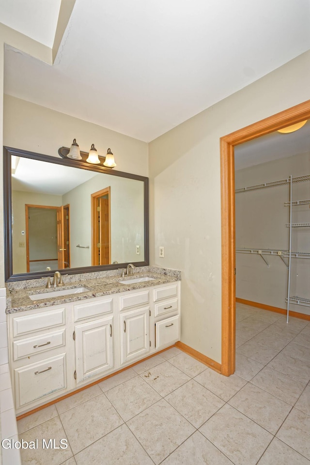 33 Cindy Ln, Halfmoon, NY 12065 - full bathroom with double vanity and tile patterned flooring