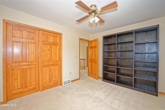 33 Cindy Ln, Halfmoon, NY 12065 - unfurnished bedroom featuring carpet flooring and a ceiling fan