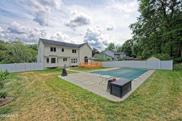 33 Cindy Ln, Halfmoon, NY 12065 - view of pool with a fenced backyard, a wooden deck, and a patio area
