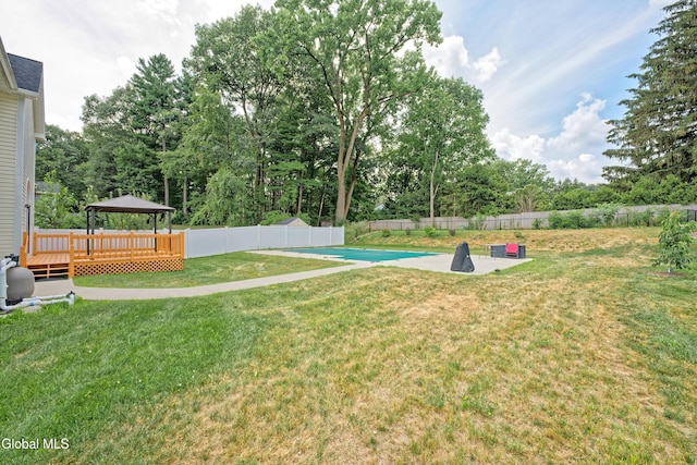 33 Cindy Ln, Halfmoon, NY 12065 - fenced backyard with a gazebo and a wooden deck